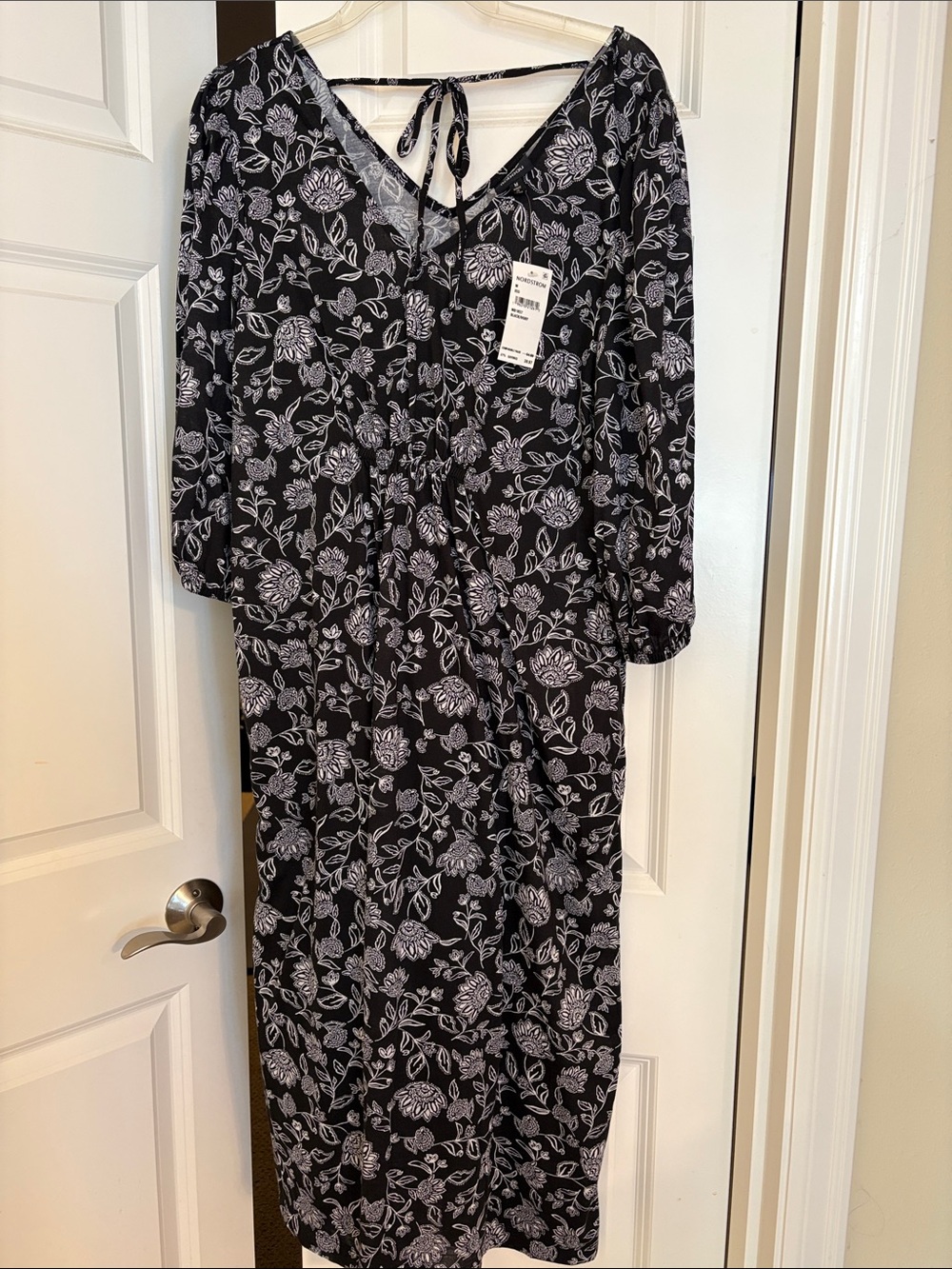 bobeau Black and Ivory Floral V‑Neck Tie Back Dress
